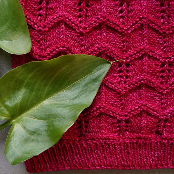 Geometric lace cowl with garter stitch knitting pattern