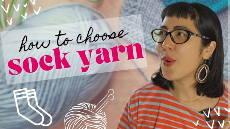 Thumbnail for video about how to choose sock yarn, showing a woman looking at a background of grey yarn