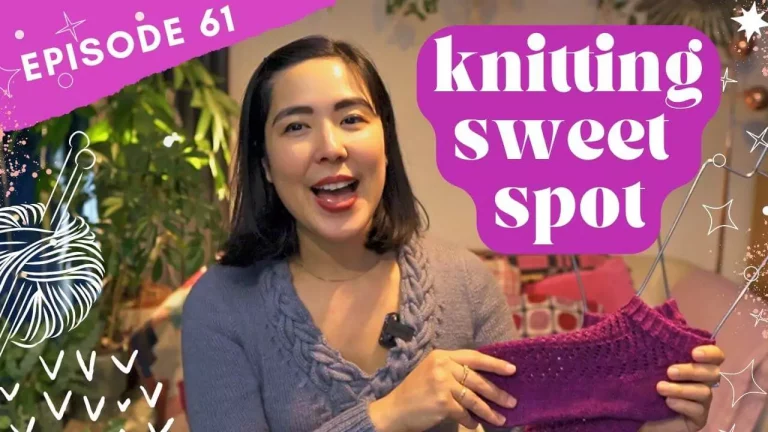 Thumbnail image for knitting studio vlog episode 61, showing a woman wearing a grey handknitted sweater, and holding a pair of violet lace socks, with text reading Knitting Sweet Spot